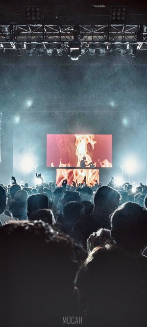 Illenium performing live with fire visuals
