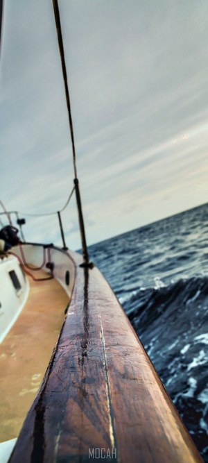 Sailing on a boat during the day