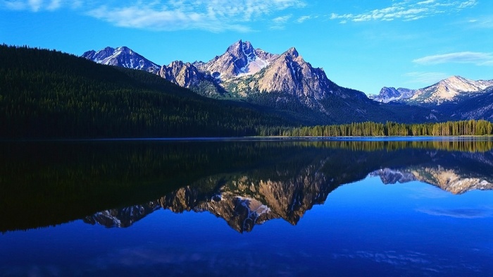 Mountain range reflected in a calm lake