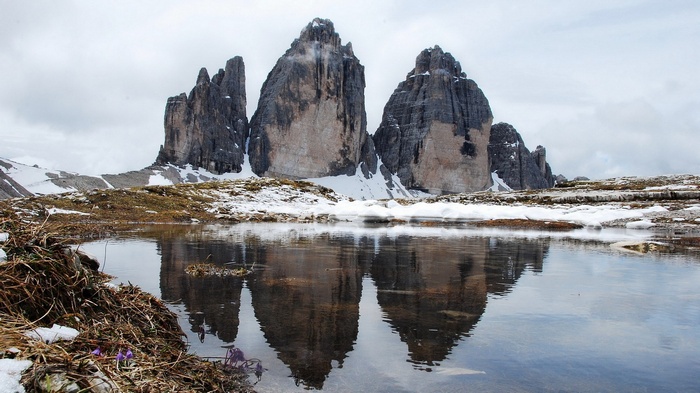 Tre Cime di Lavaredo reflected in a mountain lake