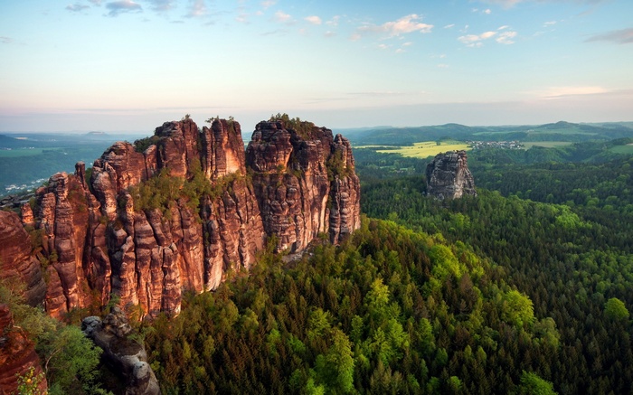 Sandstone rock formations in a forest landscape