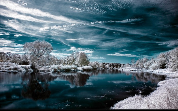 Infrared landscape with river and trees