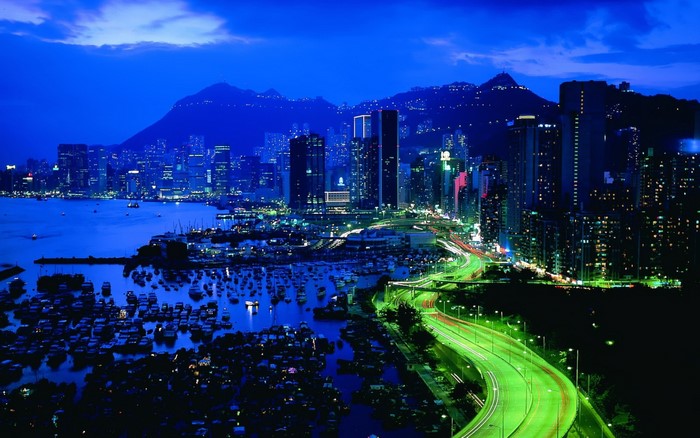 Hong Kong Cityscape at Night with Harbor and Highway