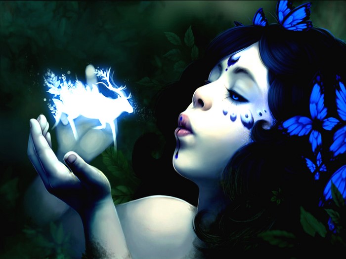 Woman holding a glowing deer spirit