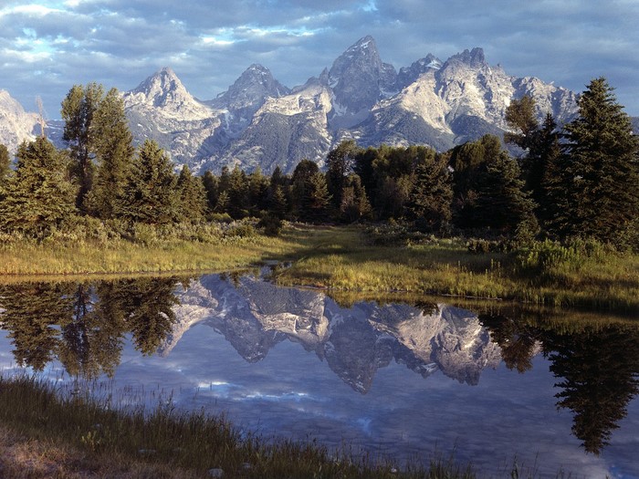 Grand Teton Mountains reflected in a calm lake