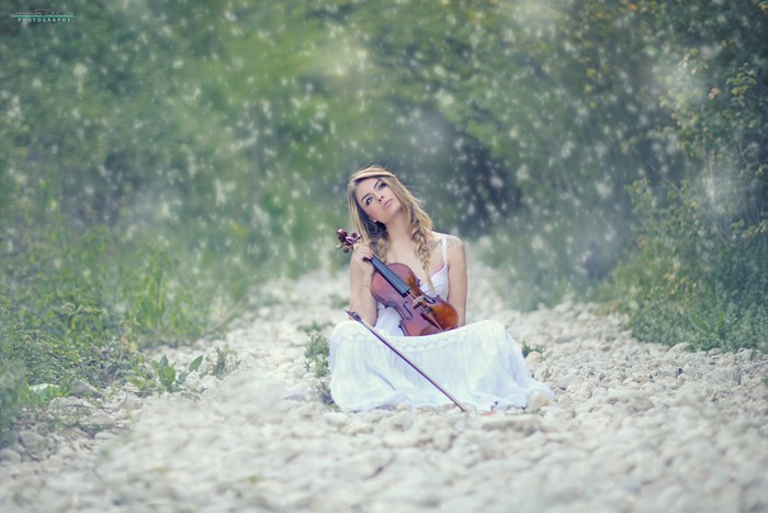 Girl with Violin in Snowfall