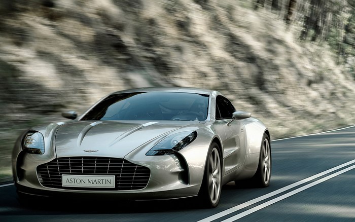 Aston Martin One-77 driving on a road