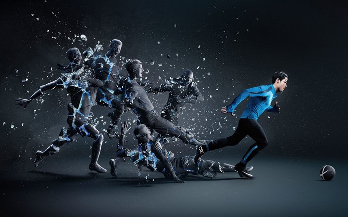 Soccer player running and shattering into pieces