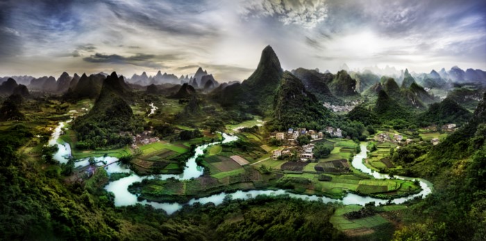 Karst landscape with river and village in China