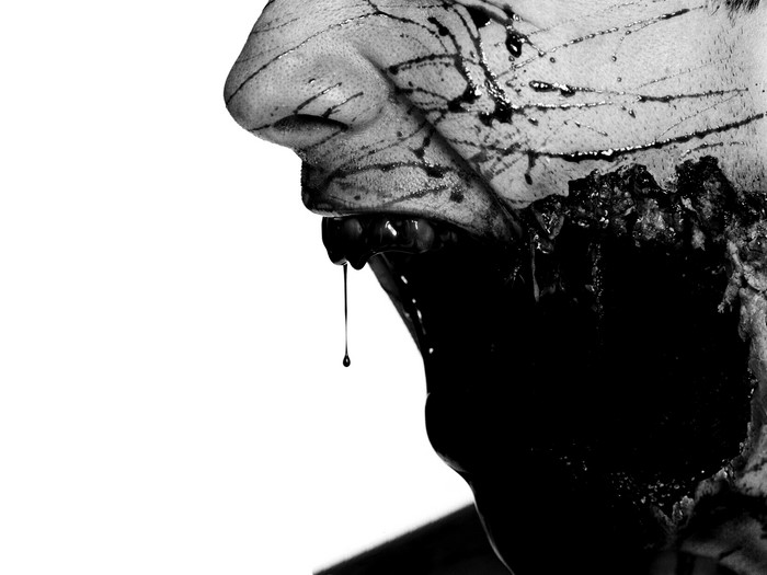 Close-up of a zombie's face with blood