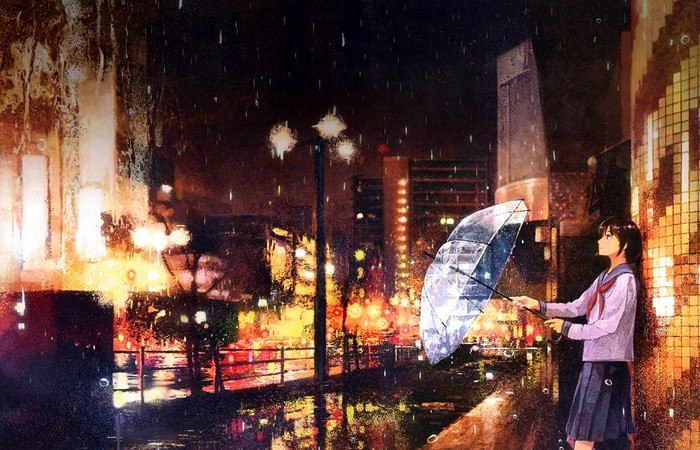 Girl with umbrella in the rain in a city