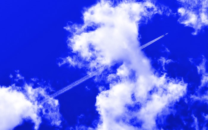 Airplane flying through clouds