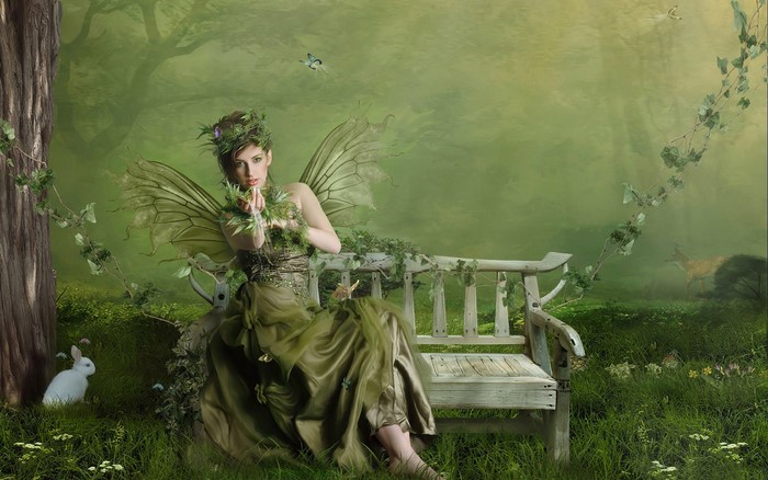Green Fairy Sitting on a Bench in a Forest