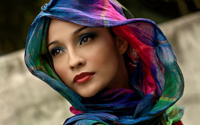 Model wearing a colorful headscarf