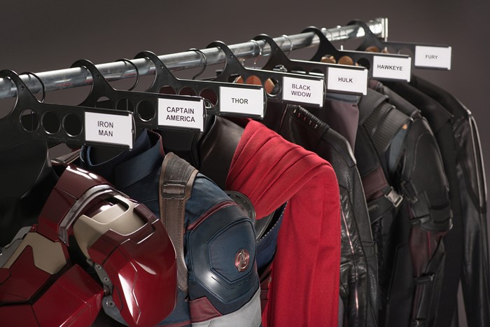 Avengers costumes on a rack