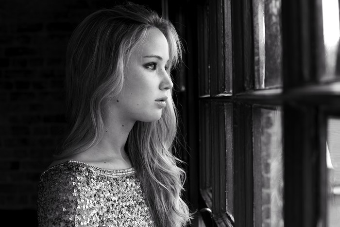 Jennifer Lawrence looking out a window
