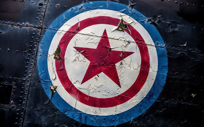 Captain America's Shield Logo on Textured Surface