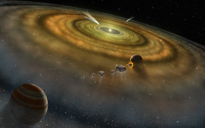 Protoplanetary disk with forming planets and comets