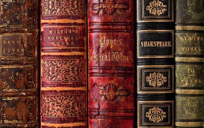 Collection of antique books by Dryden, Milton, Pope, Shakespeare, and Byron