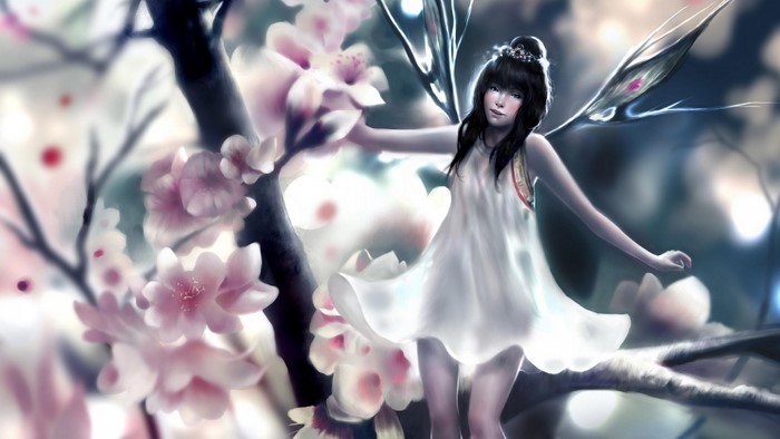 Fairy with wings among cherry blossoms