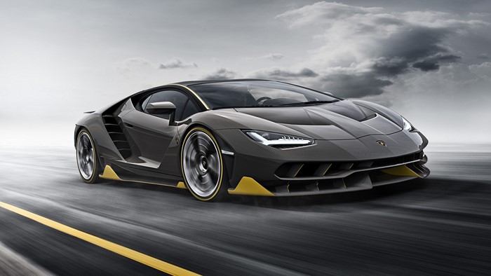 Lamborghini Centenario driving on a road