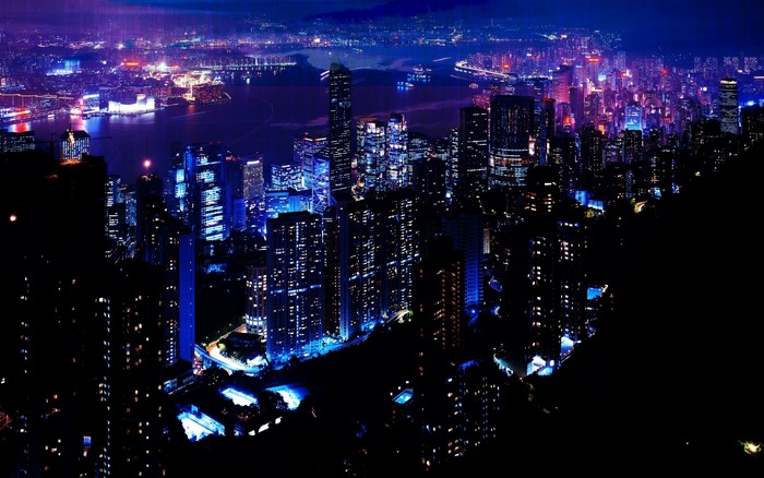 Nighttime cityscape of Hong Kong and Victoria Harbour