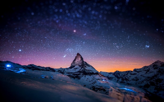 Matterhorn mountain under a starry sky