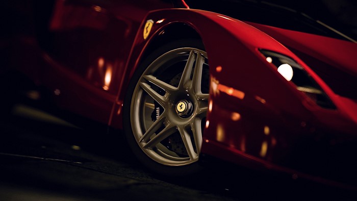 Red Ferrari car wheel and fender