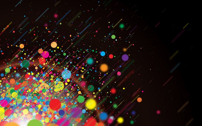 Colorful abstract particles and streaks on black