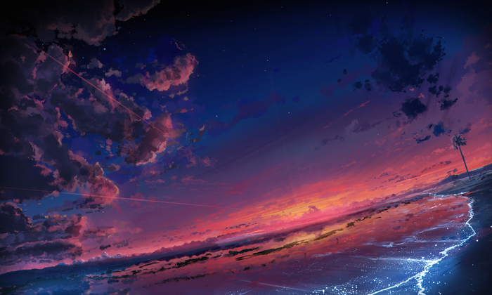 Sunset over a beach with clouds