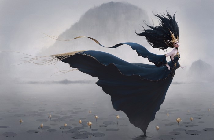 Taoist fairy in dark dress on a misty lake