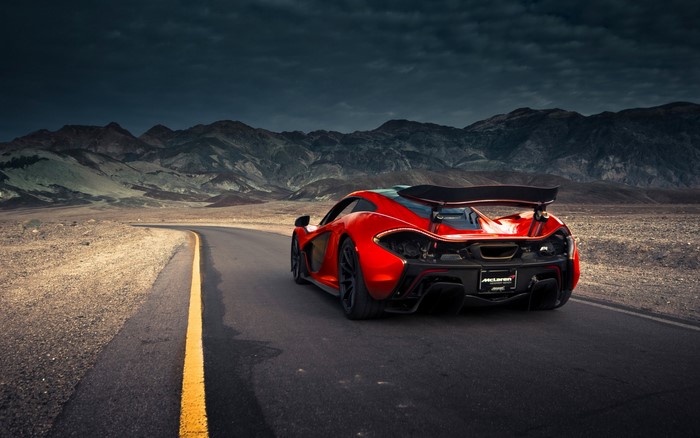 Red McLaren P1 Sport Car on Desert Road