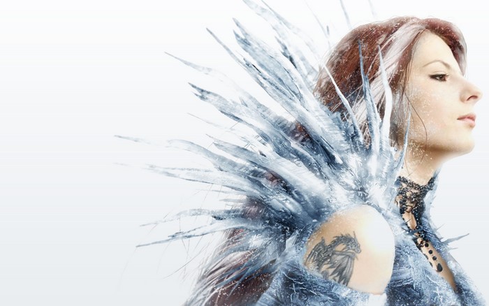 Woman with ice shards and dragon tattoo