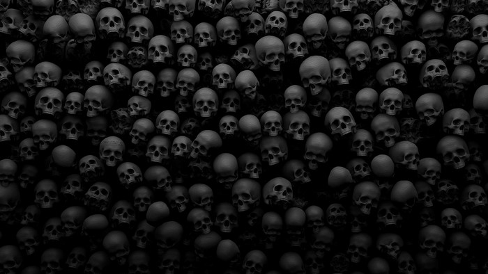 A dark background filled with many skulls