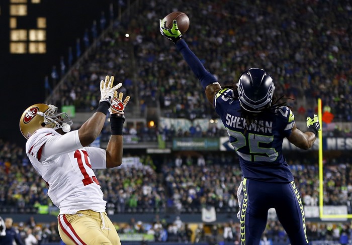 Richard Sherman of Seattle Seahawks catching football