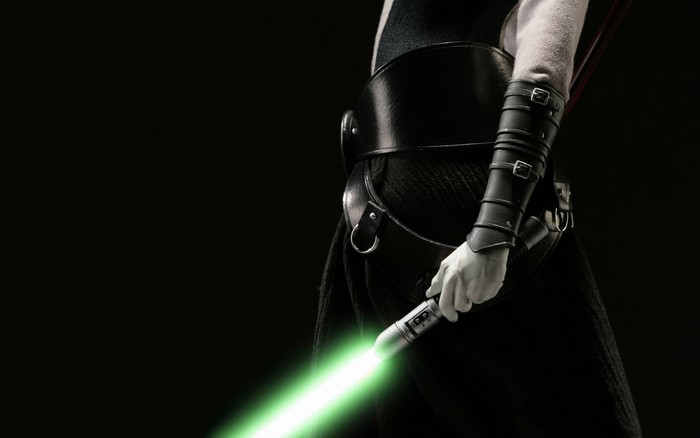 Star Wars character with green lightsaber