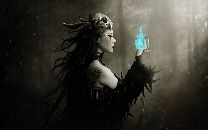 Dark fantasy woman with skull headdress and blue magic