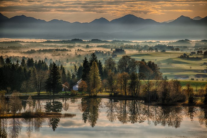 Misty Mountains and Lake Reflection