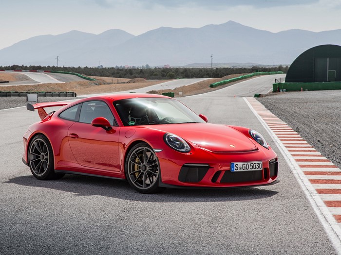 Red Porsche 911 GT3 on a Racetrack
