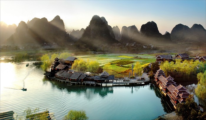 Village on the Li River with karst mountains