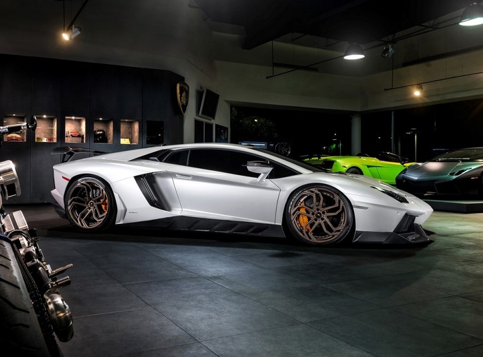 White Lamborghini Aventador in a showroom