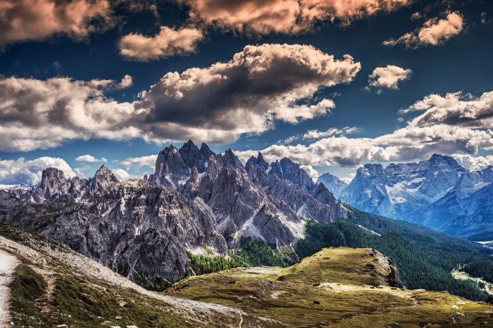 Mountain Range Under Dramatic Clouds