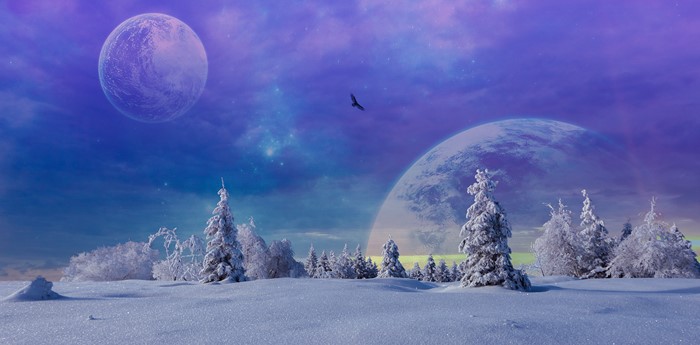 Fantasy winter landscape with two planets and an eagle