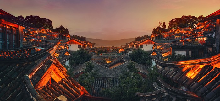 Night view of traditional Chinese village rooftops in Lijiang, Yunnan