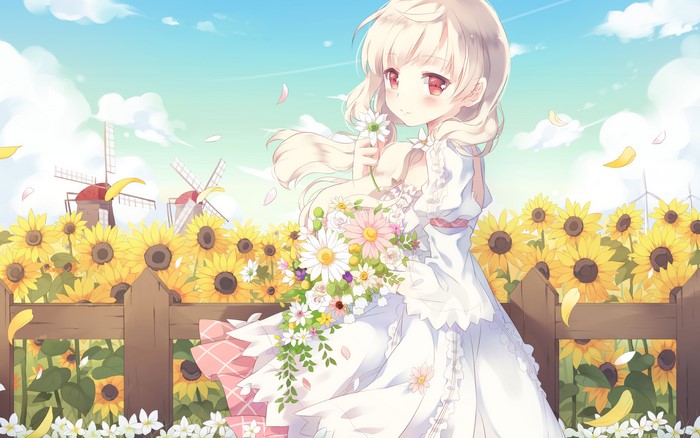 Girl in white dress holding flowers in sunflower field
