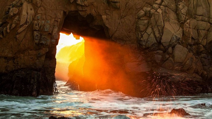 Sunbeam through a coastal cave entrance
