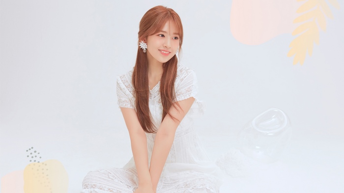 Yujin from IZ*ONE in white dress