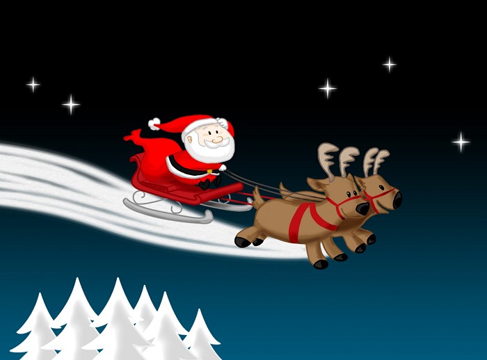 Santa Claus flying in a sleigh pulled by reindeer