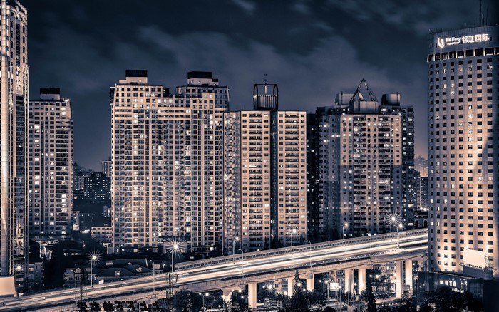 Night view of Shanghai skyscrapers and elevated highway