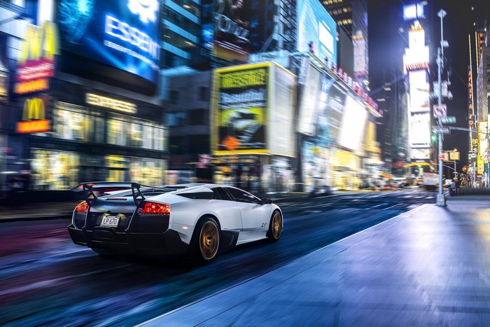 White Lamborghini Murcielago driving in Times Square at night